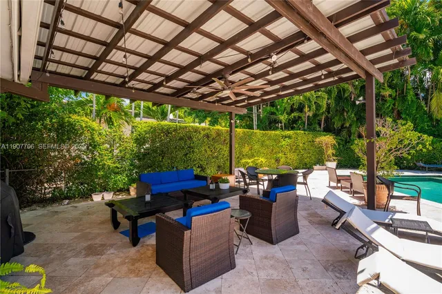 a outdoor living space with furniture and garden view
