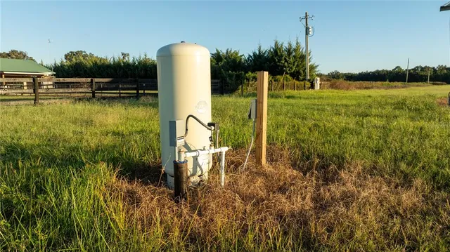 a view of a lake with a house
