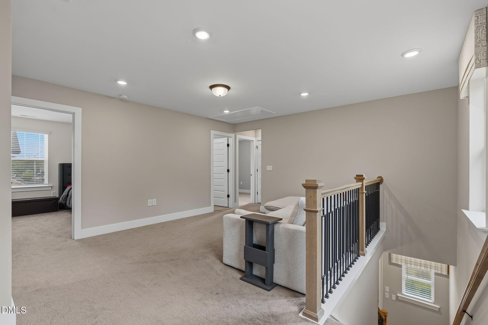 438 Diversity Way Raleigh, NC 27610 - Photo 17 of 33 a view of a livingroom with a staircase