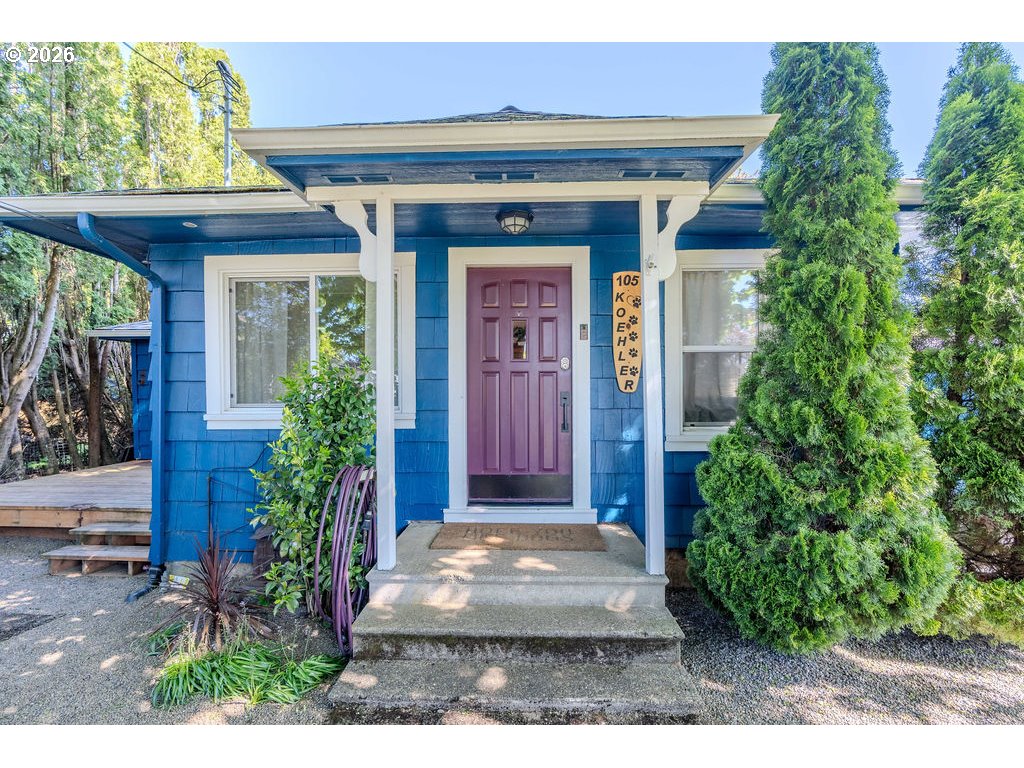 105 Northwest 13th Street Gresham, OR 97030 - Photo 1 of 45 a front view of a house with garden