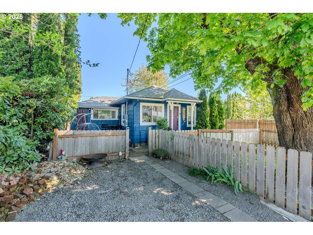 105 Northwest 13th Street Gresham, OR 97030 - Photo 2 of 45 a front view of a house with a garden