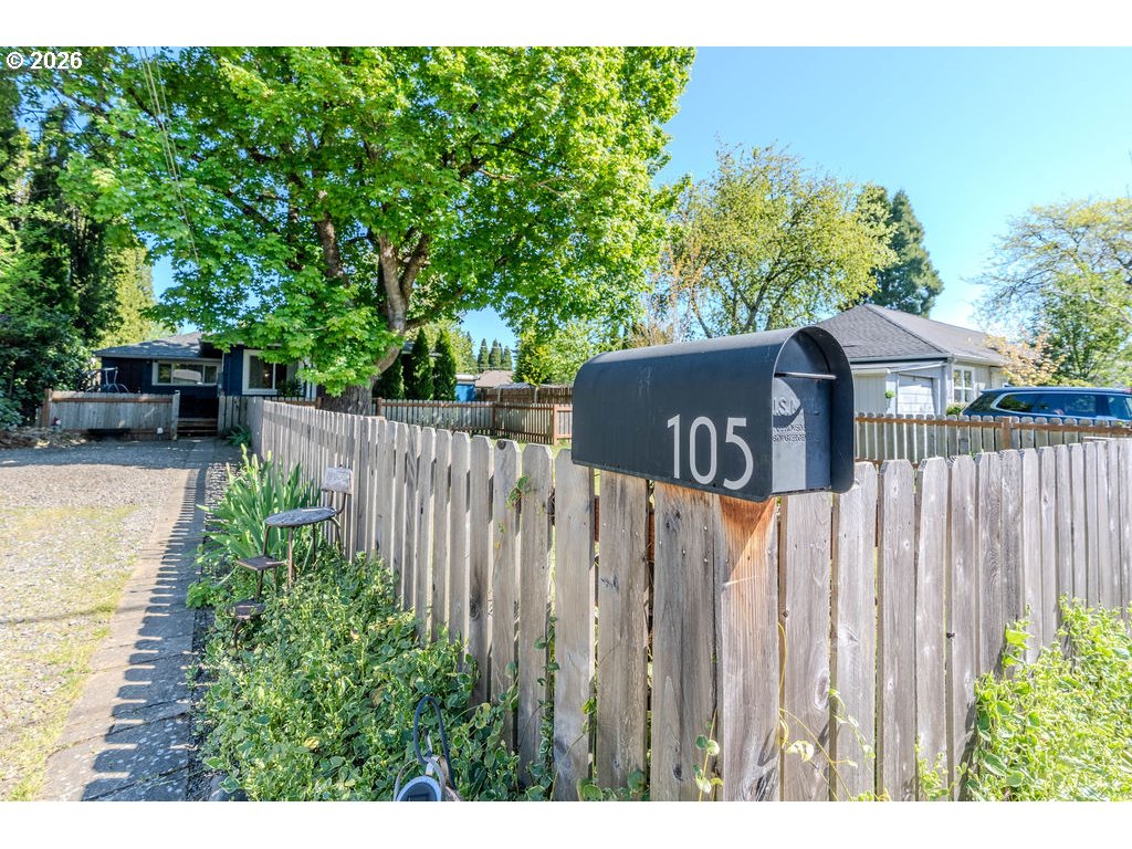 105 Northwest 13th Street Gresham, OR 97030 - Photo 5 of 45 a view of a wooden fence