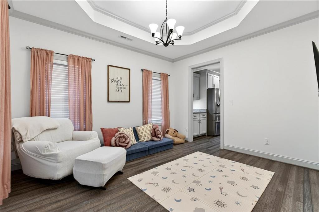 4 Tahlequah Street Northeast Rome, GA 30161 - Photo 20 of 52 a living room with furniture and a table
