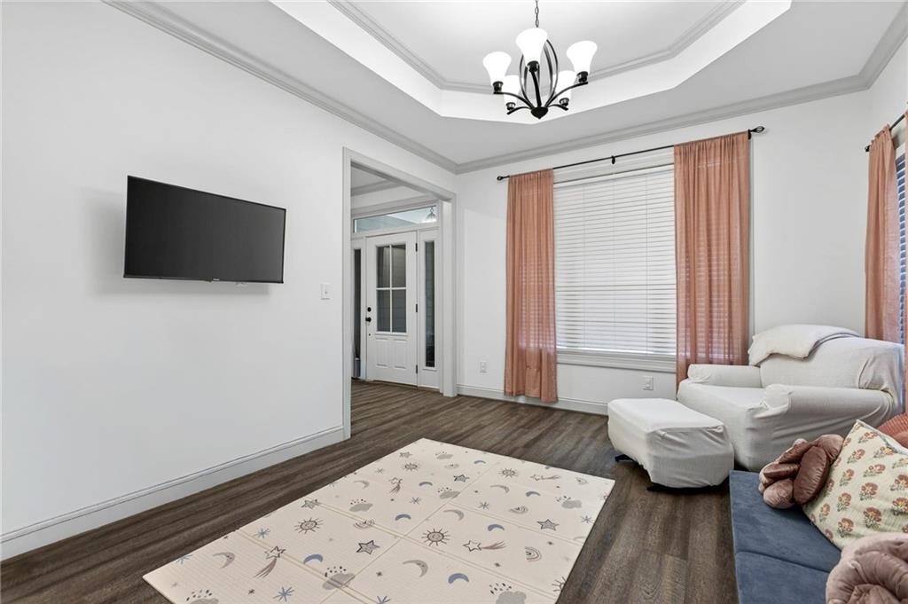 4 Tahlequah Street Northeast Rome, GA 30161 - Photo 21 of 52 a living room with furniture and a flat screen tv