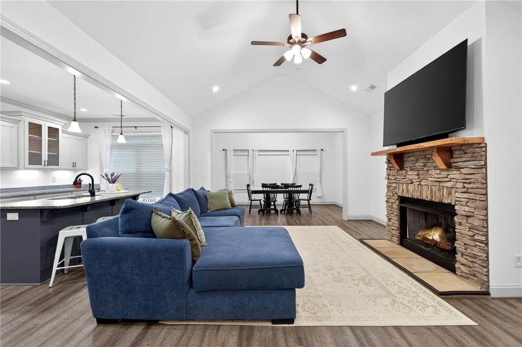 4 Tahlequah Street Northeast Rome, GA 30161 - Photo 22 of 52 a living room with furniture and a fireplace