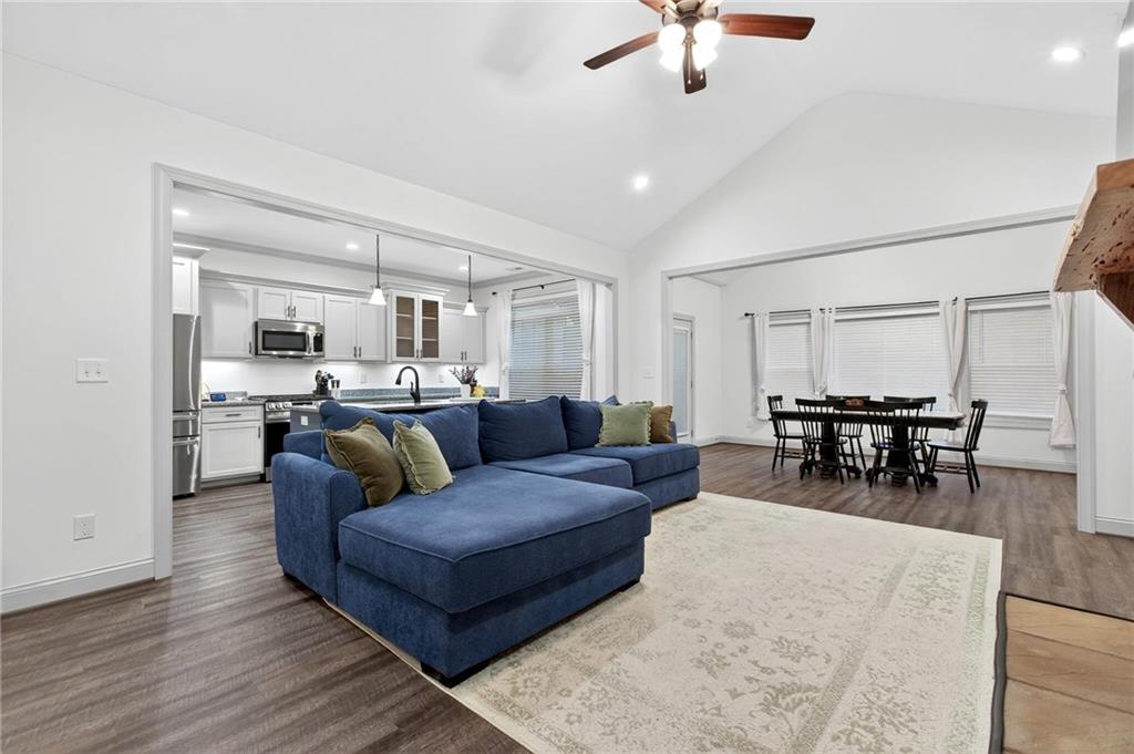 4 Tahlequah Street Northeast Rome, GA 30161 - Photo 25 of 52 a living room with furniture and a view of kitchen