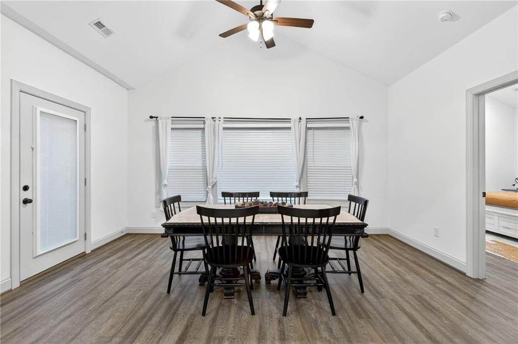 4 Tahlequah Street Northeast Rome, GA 30161 - Photo 33 of 52 a view of a dining room with furniture and wooden floor