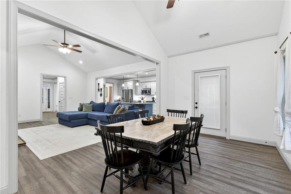 4 Tahlequah Street Northeast Rome, GA 30161 - Photo 34 of 52 a view of a dining room with furniture window and wooden floor