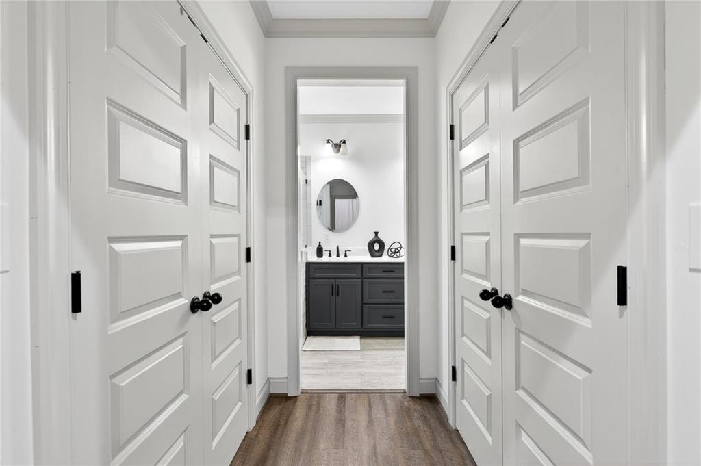 4 Tahlequah Street Northeast Rome, GA 30161 - Photo 38 of 52 a bathroom with a double vanity sink and mirror