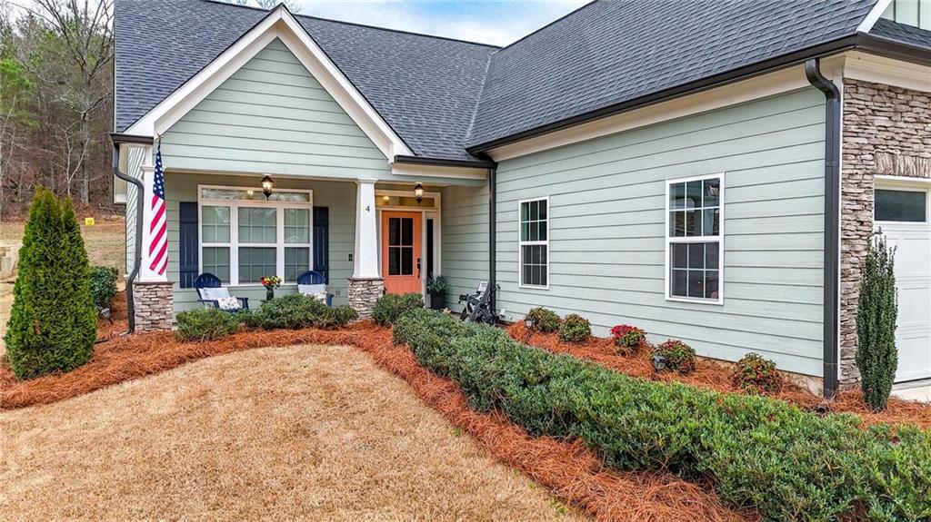 4 Tahlequah Street Northeast Rome, GA 30161 - Photo 4 of 52 a front view of a house with a yard