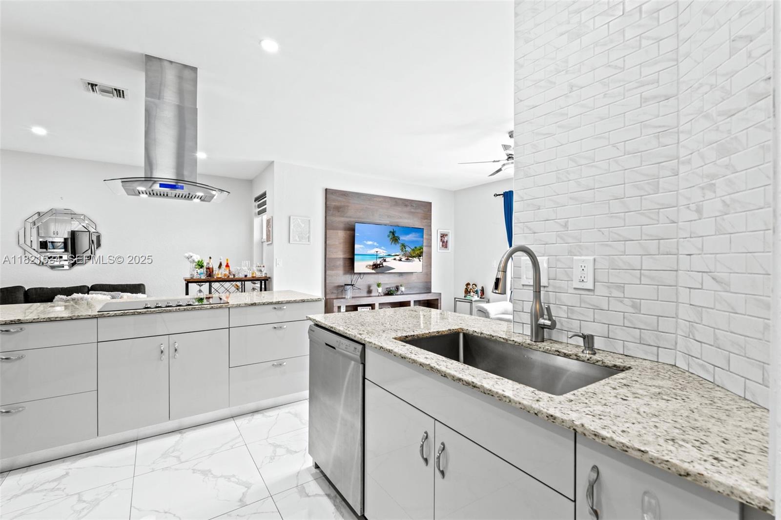 13745 Southwest 113th Lane Miami, FL 33186 - Photo 23 of 53 a kitchen with sink and mirror