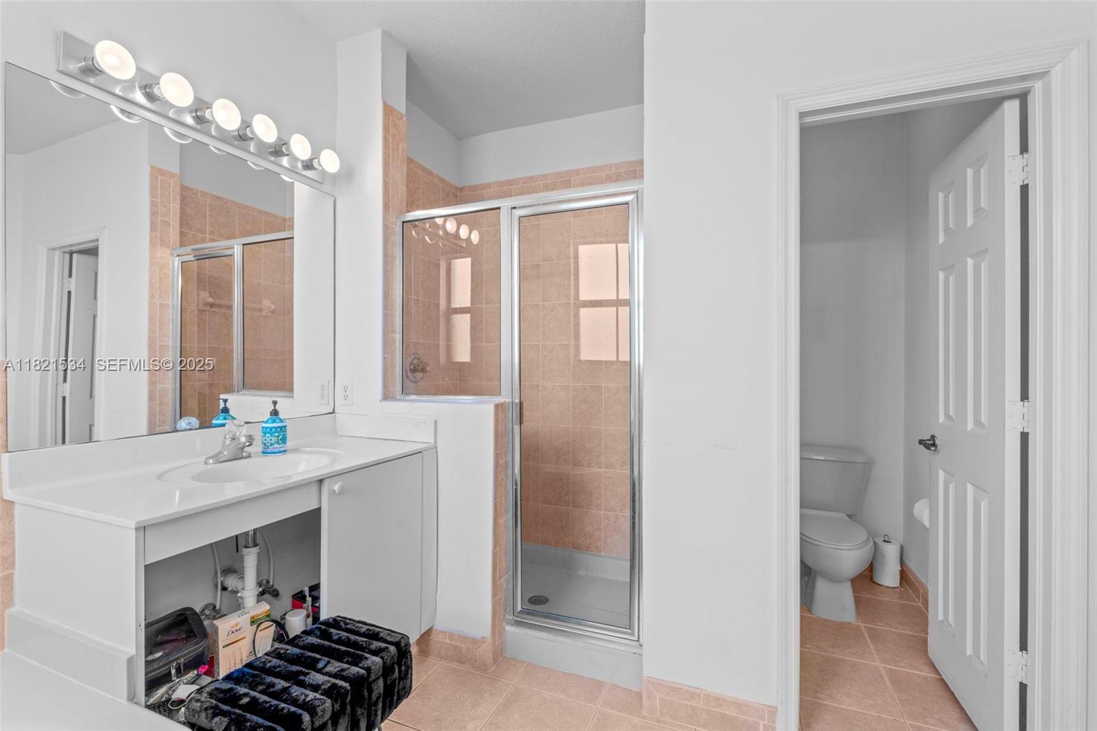 13745 Southwest 113th Lane Miami, FL 33186 - Photo 35 of 53 a room with a sink and a mirror