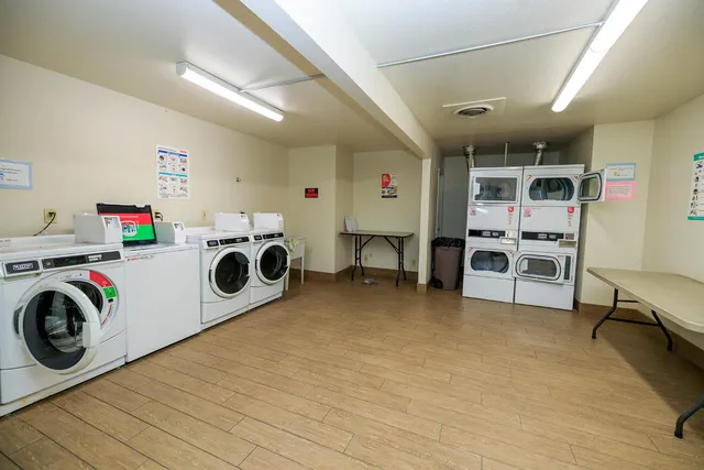 a view of a storage & utility room with washer and dryer