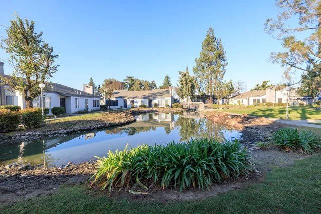 a view of a lake with houses