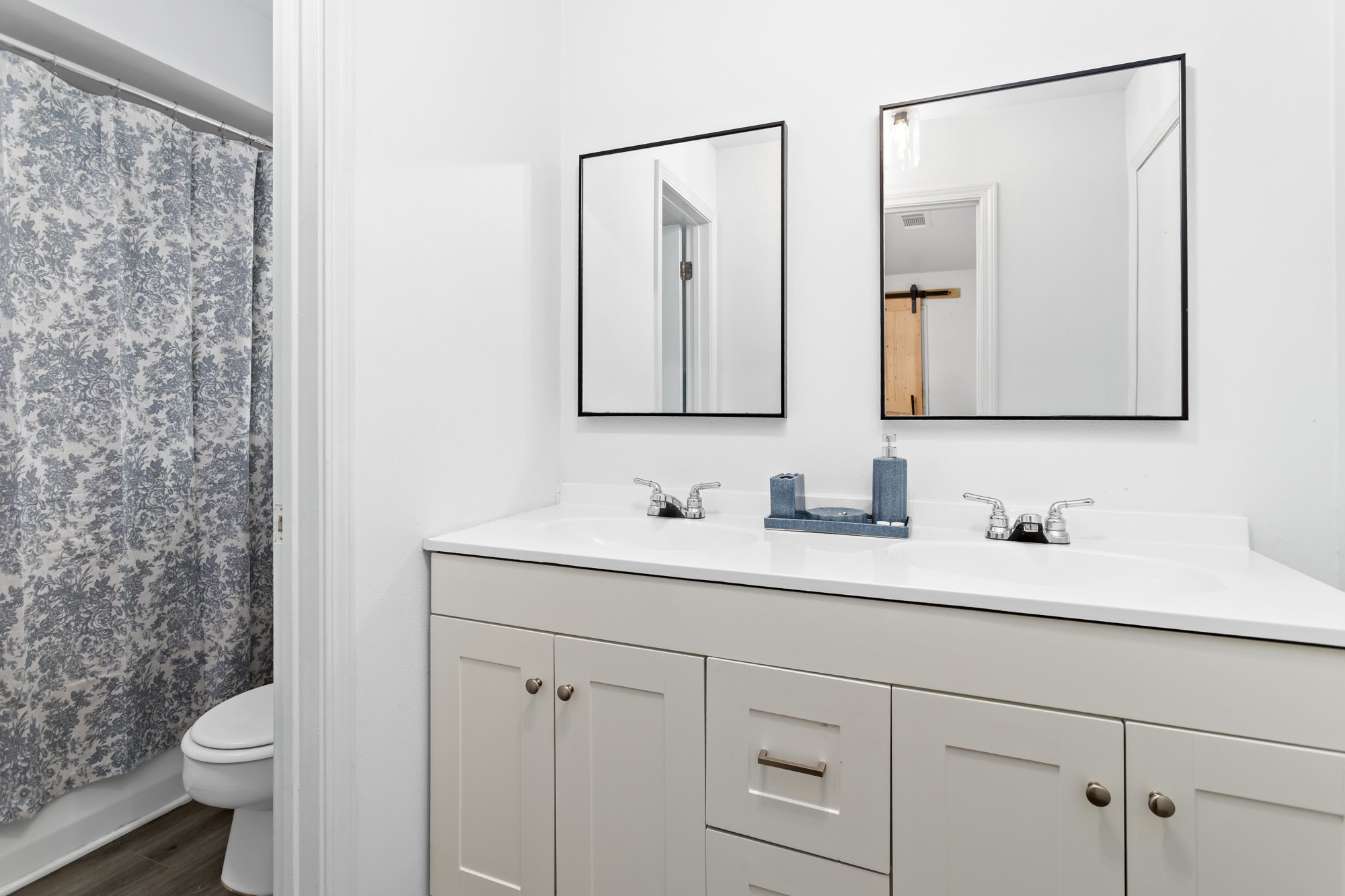 9994 Ruby Lane Silsbee, TX 77656 - Photo 11 of 17 a bathroom with a granite countertop sink mirror and toilet