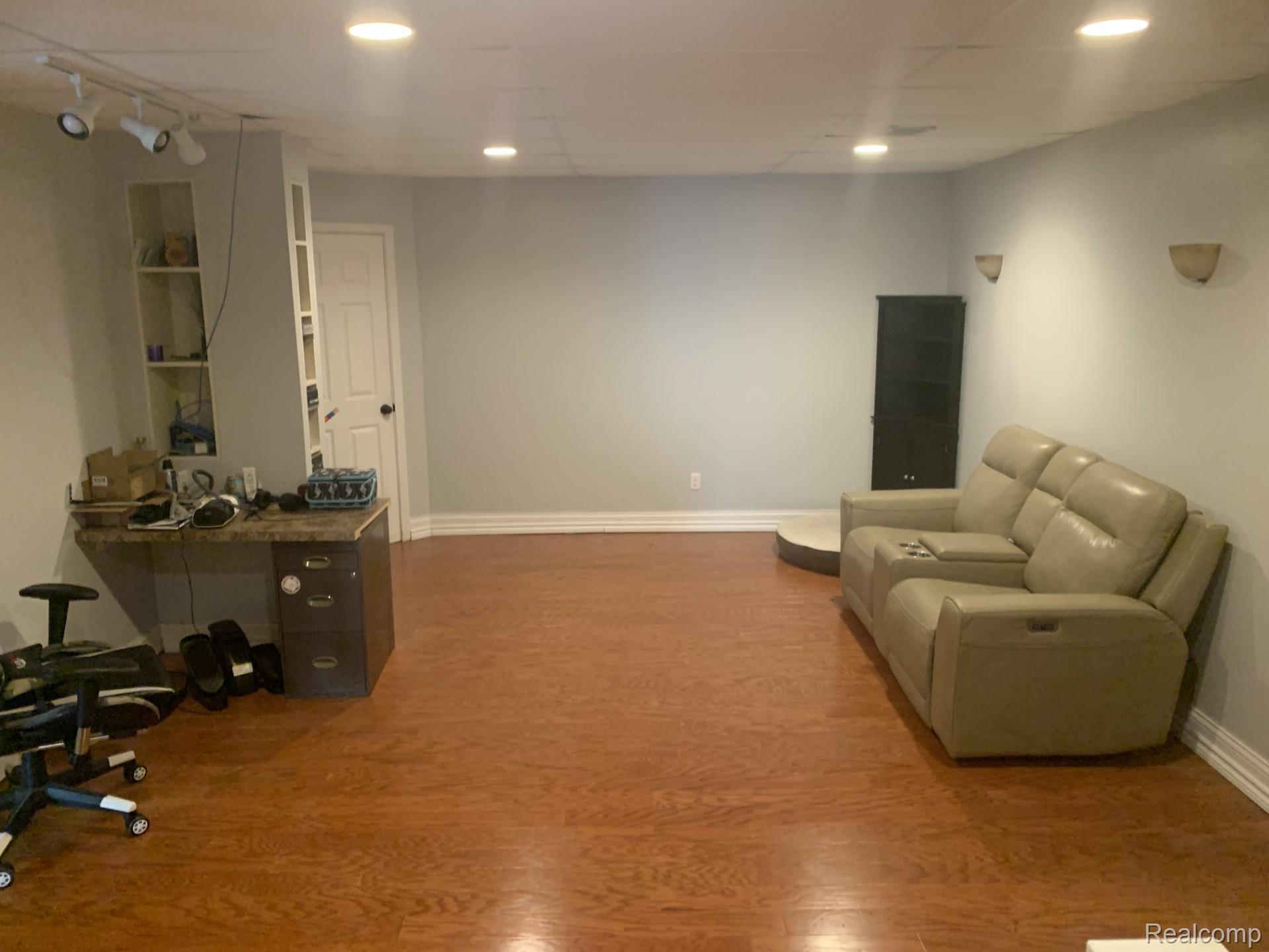 3068 West Cook Road Grand Blanc, MI 48439 - Photo 18 of 31 3068 Cook basement family room.jpg