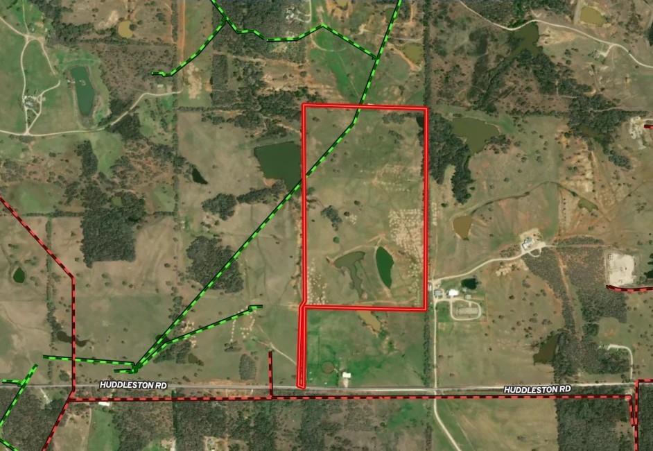 54-ac Huddleston Road Sunset, TX 76270 - Photo 12 of 13 an aerial view of a houses with yard