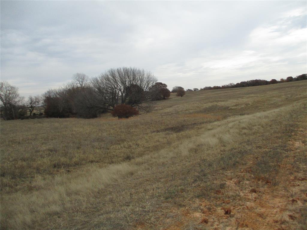 54-ac Huddleston Road Sunset, TX 76270 - Photo 5 of 13 a view of a field with an ocean
