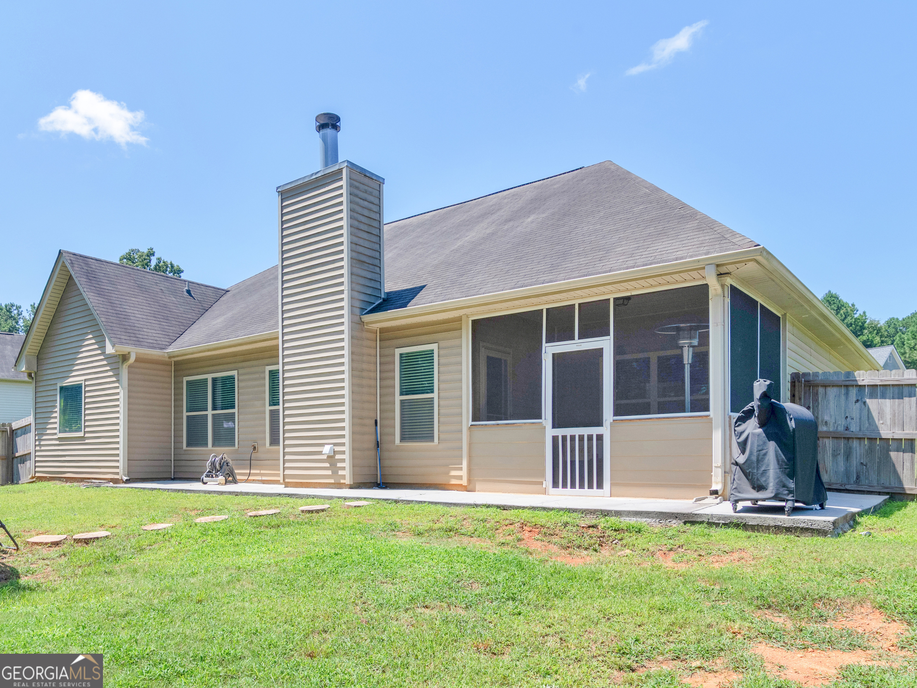 601 Amerigo Court Locust Grove, GA 30248 - Photo 22 of 23 a view of a house with a yard