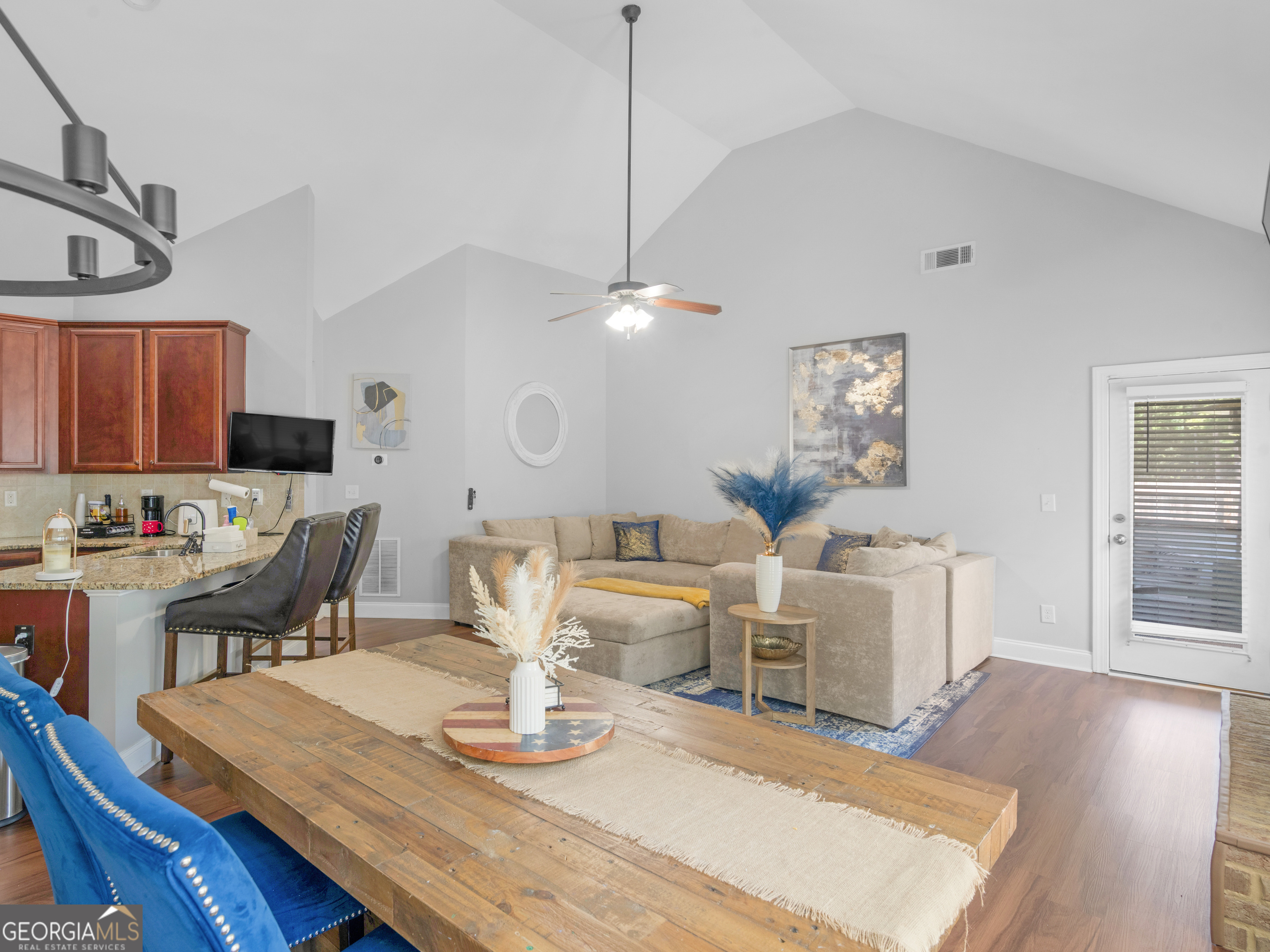 601 Amerigo Court Locust Grove, GA 30248 - Photo 7 of 23 a living room with furniture and wooden floor