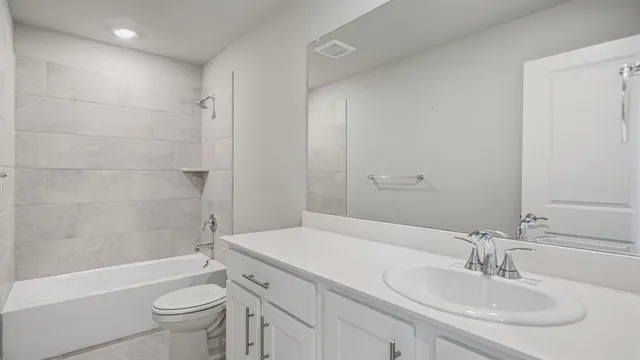 a black and white photo of a living room