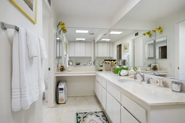 a kitchen with a sink cabinets and counter space