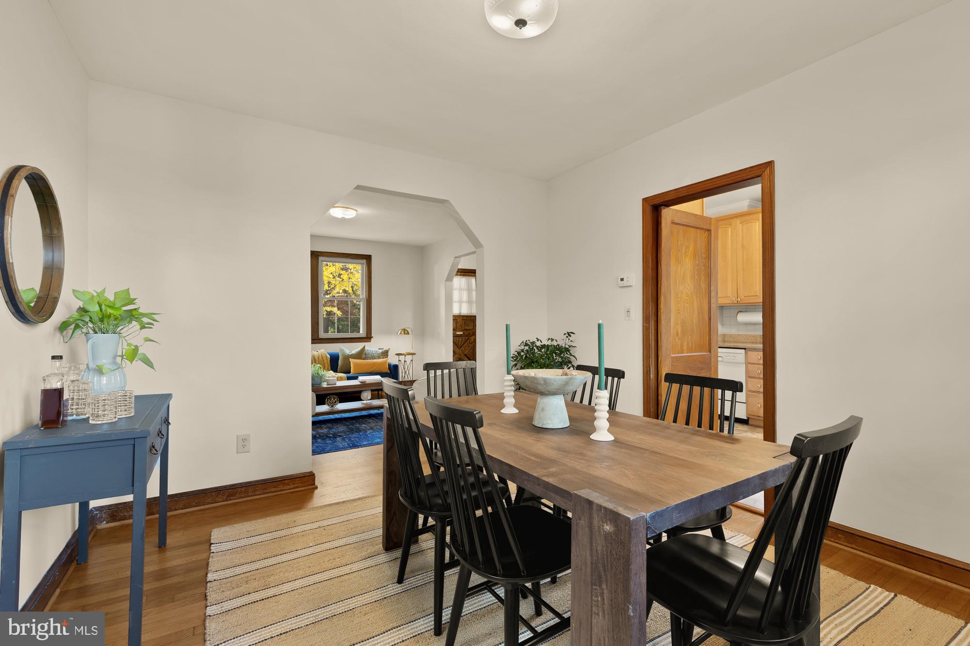 3141 Central Avenue Northeast Washington, DC 20018 - Photo 11 of 38 a view of a dining room with furniture and wooden floor
