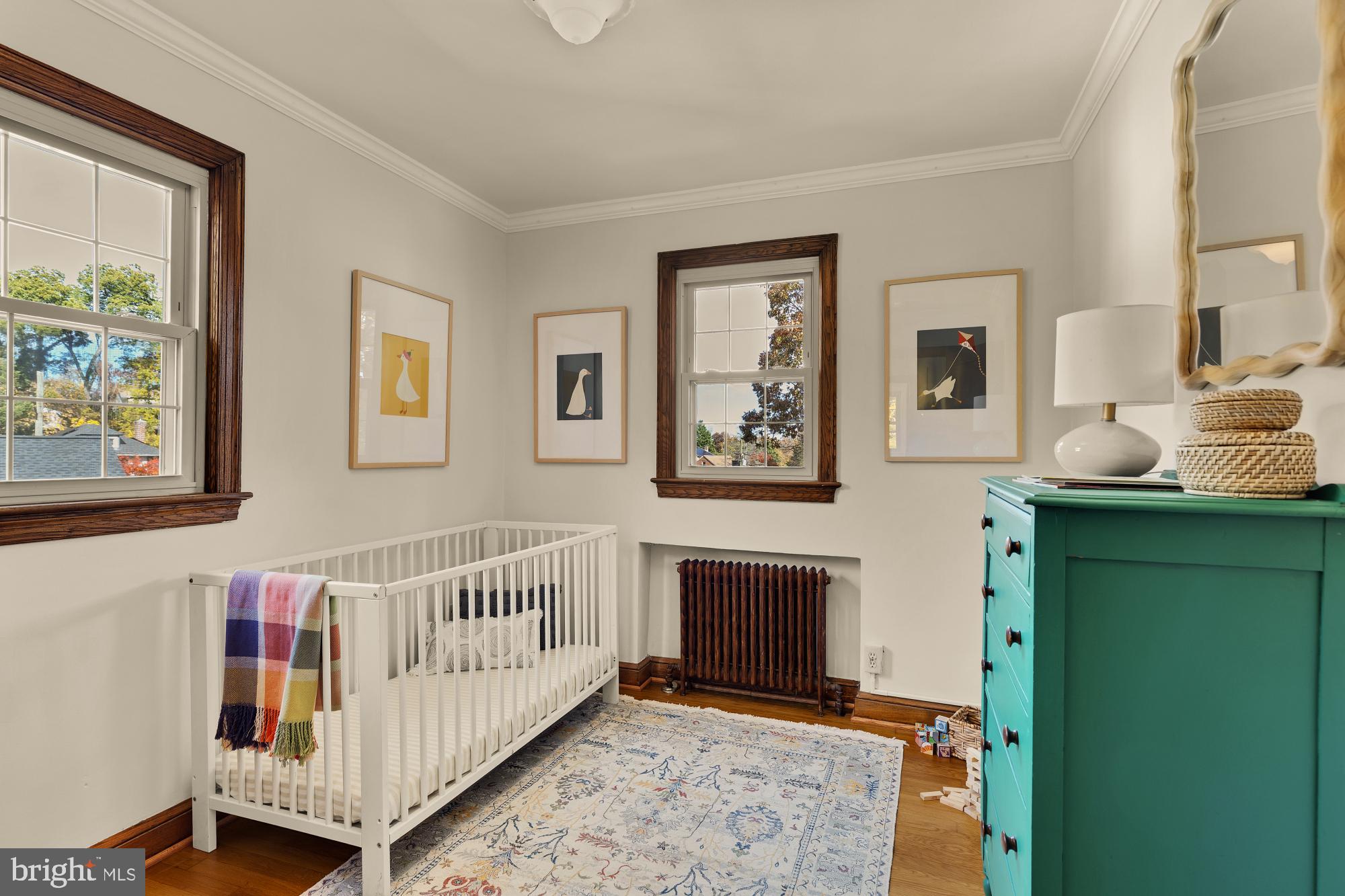 3141 Central Avenue Northeast Washington, DC 20018 - Photo 17 of 38 a bedroom with furniture and a window