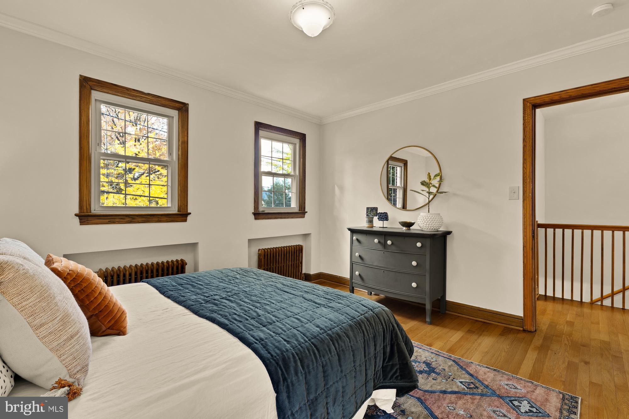 3141 Central Avenue Northeast Washington, DC 20018 - Photo 23 of 38 a bedroom with a bed and a dresser