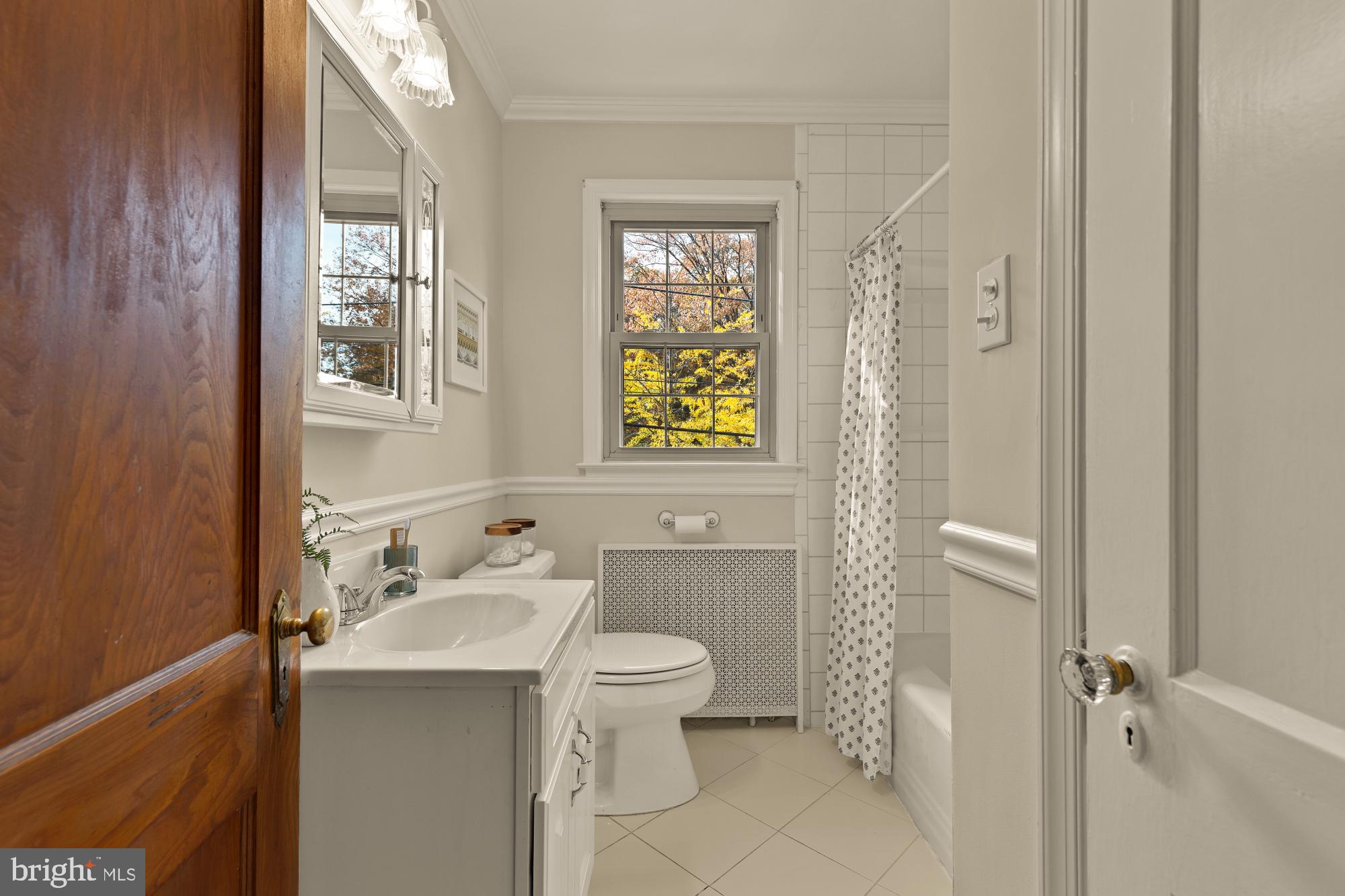3141 Central Avenue Northeast Washington, DC 20018 - Photo 26 of 38 a bathroom with a sink toilet and shower