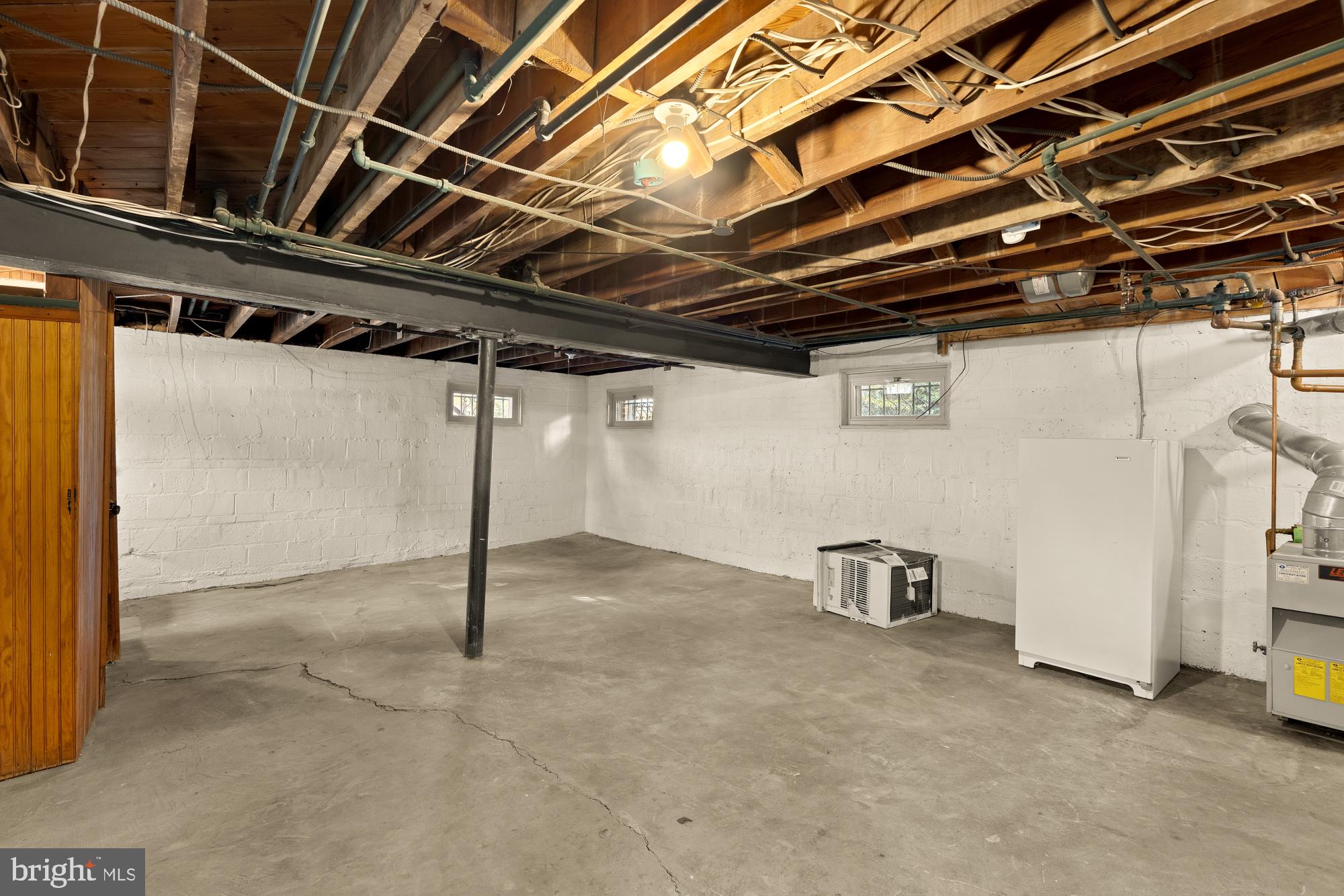3141 Central Avenue Northeast Washington, DC 20018 - Photo 29 of 38 a view of empty room with wooden ceiling