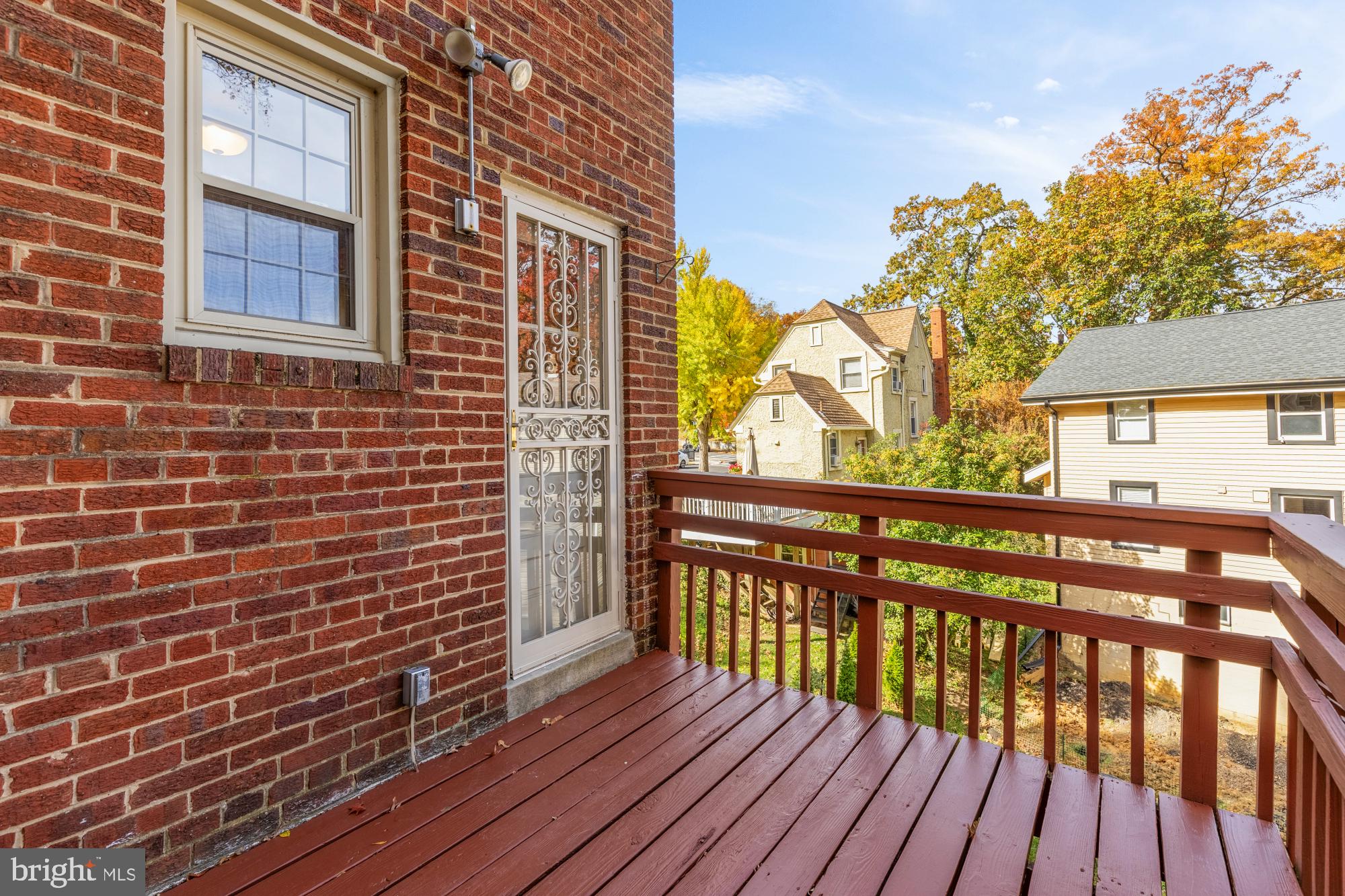 3141 Central Avenue Northeast Washington, DC 20018 - Photo 33 of 38 a view of wooden balcony with a potted plants
