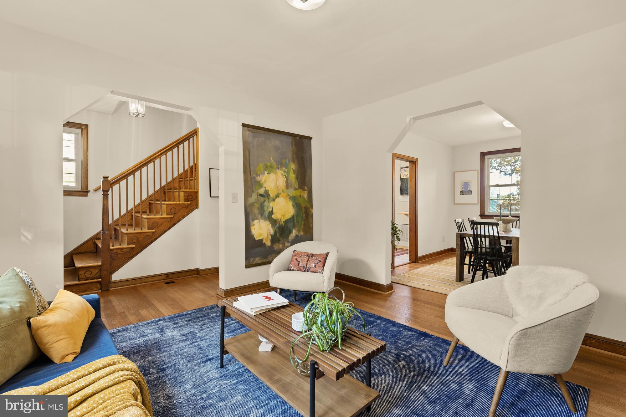 3141 Central Avenue Northeast Washington, DC 20018 - Photo 9 of 38 a living room with furniture and a dining table