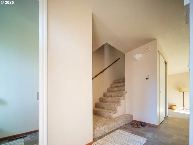 a view of entryway with wooden floor