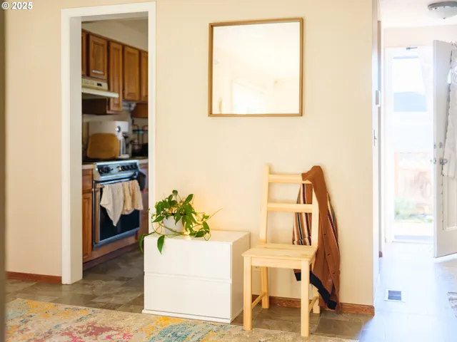 a kitchen with a sink stove and refrigerator