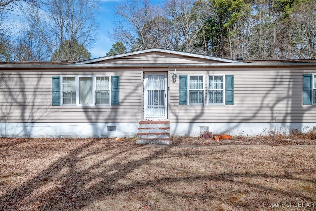 8633 Guinea Road Hayes, VA 23072 - Photo 4 of 30 Manufactured / mobile home with a front lawn