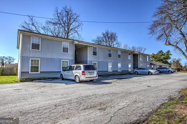a car parked in front of a house