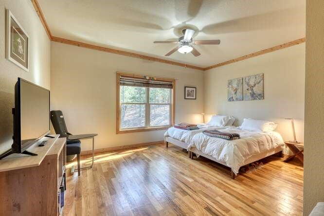 2081 Gallatin Road Young Harris, GA 30582 - Photo 20 of 44 a spacious bedroom with a bed and a window