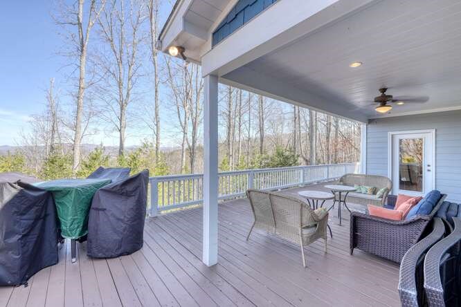 2081 Gallatin Road Young Harris, GA 30582 - Photo 31 of 44 a living room with furniture and wooden floor