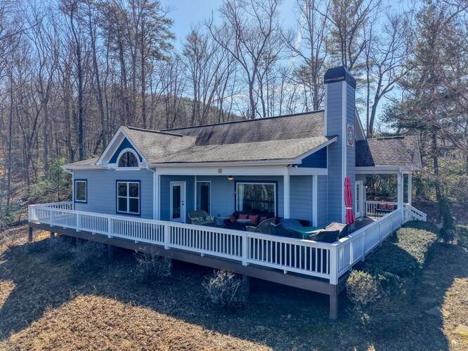 2081 Gallatin Road Young Harris, GA 30582 - Photo 38 of 44 a view of a house with a yard and wooden deck