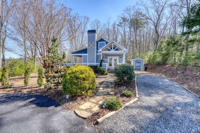 2081 Gallatin Road Young Harris, GA 30582 - Photo 44 of 44 a front view of a house with garden