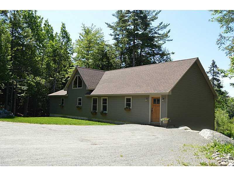 8 Beech Ridge Lane Otis, ME 04605 - Photo 2 of 34 Exterior Front. This is the side of...