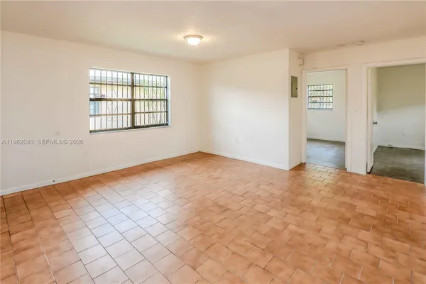 an empty room with windows