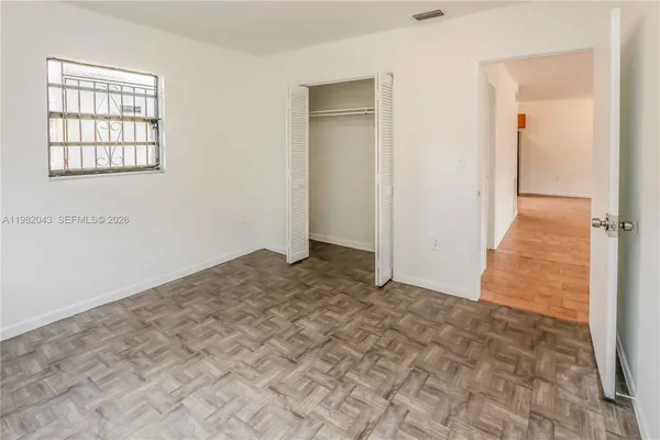 an empty room with windows