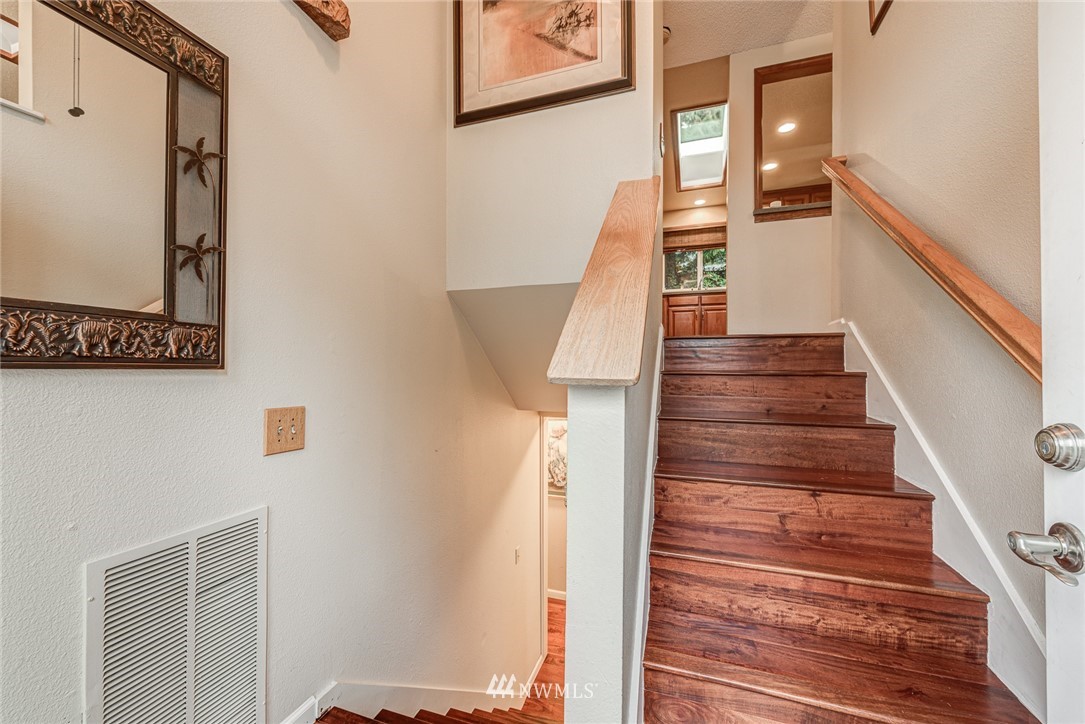 2001 172nd Place Southeast Bothell, WA 98012 - Photo 5 of 32 a view of entryway and hall with wooden floor