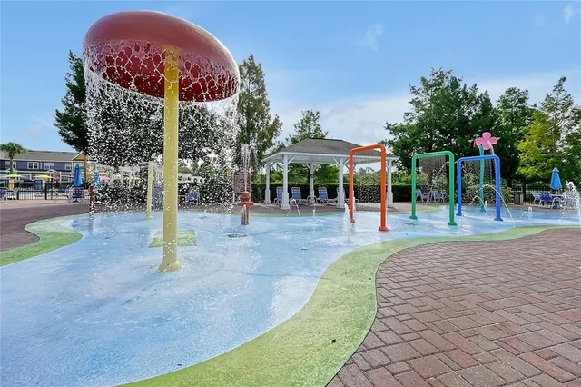 a view of a swimming pool with a patio