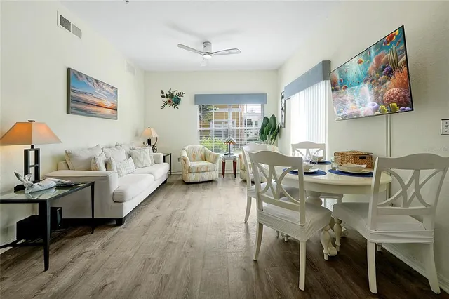 a living room with furniture and a table