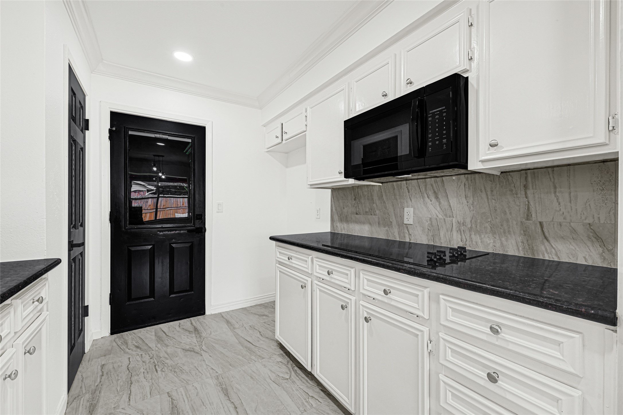 4102 Townes Forest Road Friendswood, TX 77546 - Photo 14 of 50 Well-designed kitchen area with plenty of storage and a practical layout for everyday use.