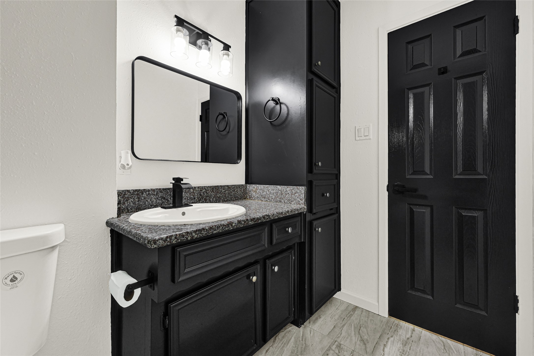 4102 Townes Forest Road Friendswood, TX 77546 - Photo 28 of 50 Sleek bathroom vanity with updated finishes, ample storage, and clean design.