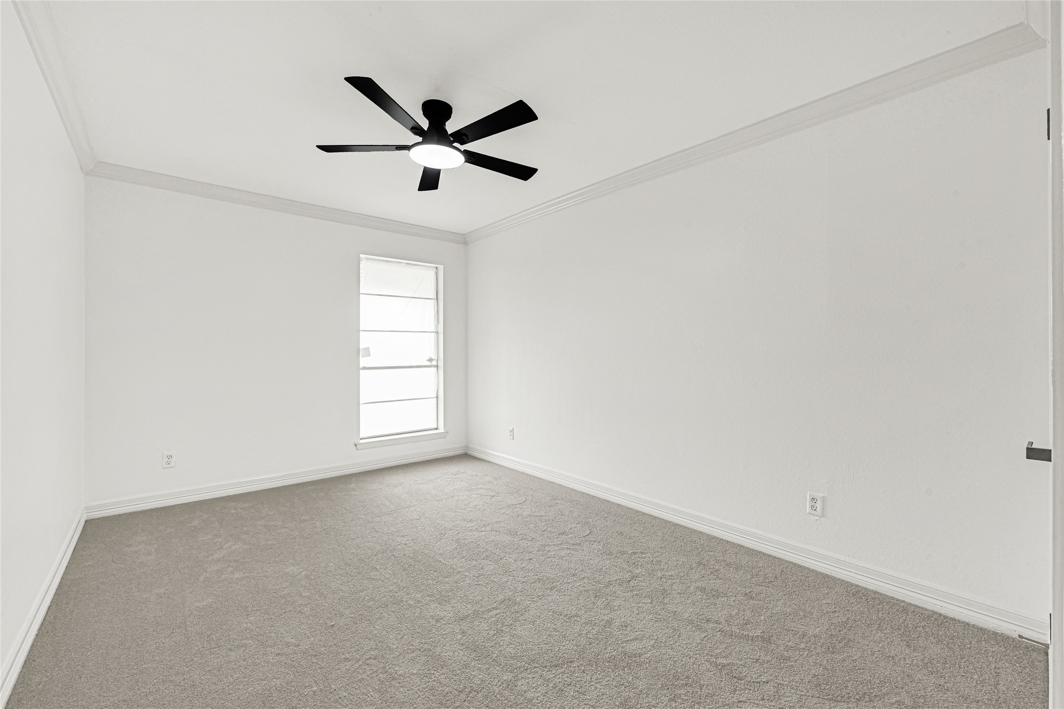 4102 Townes Forest Road Friendswood, TX 77546 - Photo 29 of 50 Comfortable bedroom with neutral tones, ceiling fan, and natural light.